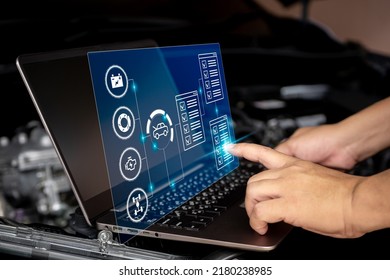 Car Business And Service Concept, Technician Use Laptop To Check Car Service In The Digital List Battery Brake Engine Suspension On Virtual Screen,Technology Of Car Maintenance In Car Service Center