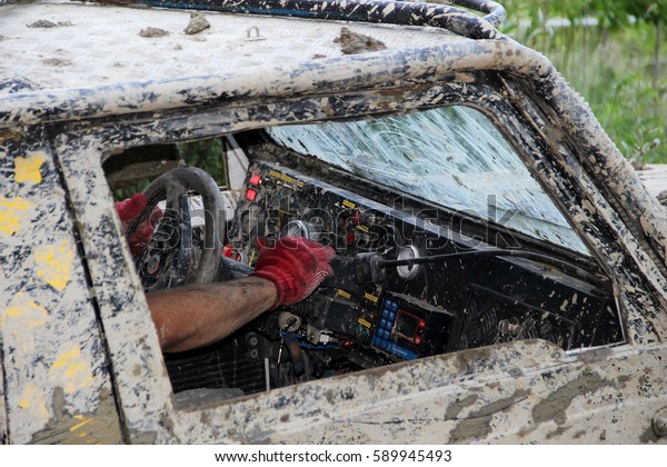 Car cabin of muddy Off-road\
car 