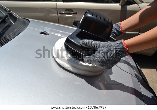 Car care with power buffer machine at\
service station - a series of CAR CARE\
images.