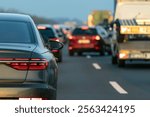 Car changes lanes in a traffic jam on the highway