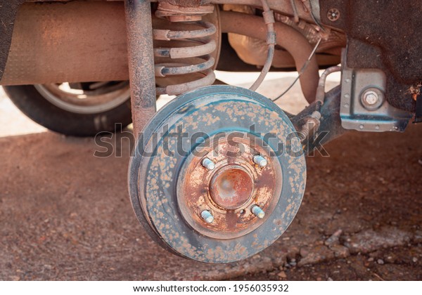Car chassis repair, wheel\
removal.