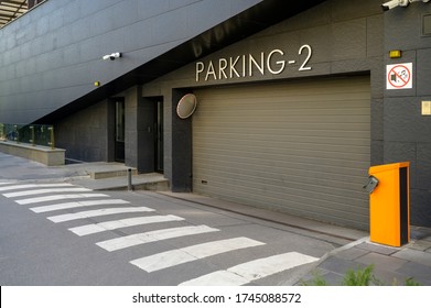 Car Check-in At The Garage For Cars Of An Apartment Building, Parking