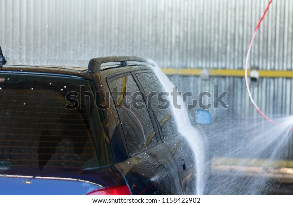 Car cleaning with car foam. Cleaning Car Using High\
Pressure Water