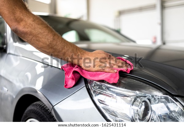 Car cleaning\
and preparation at a car\
service