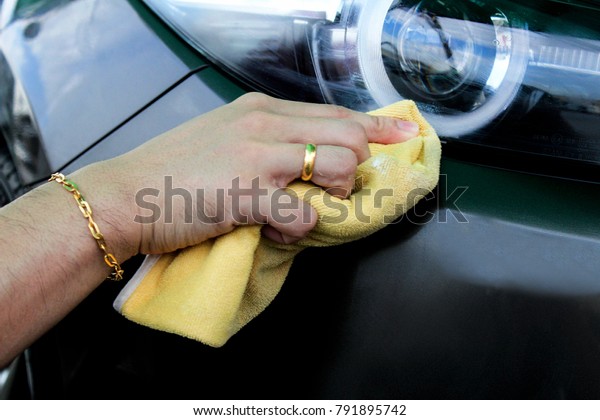 Car cleaning with car\
towel.