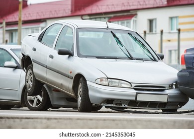 Car Collision Accident On Street. Three Cars Crashed In Front