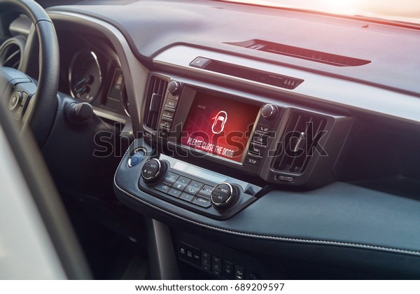 car\
computer monitor system, close door\
notification