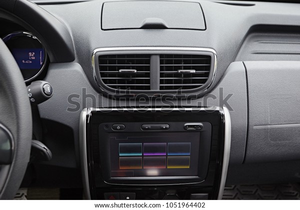 Car conditioner. The\
air flow inside the car. Detail interior. Air ducts, deflectors on\
the car panel\
