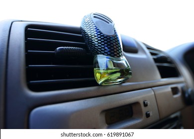 Car console and accessory on dashboard, perfume, small bag for put trivial things, air conditioner