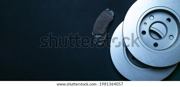 Car construct. New metal car
part. Auto motor mechanic spare or automotive piece isolated on
dark background. Automobile engine service with space for
text.