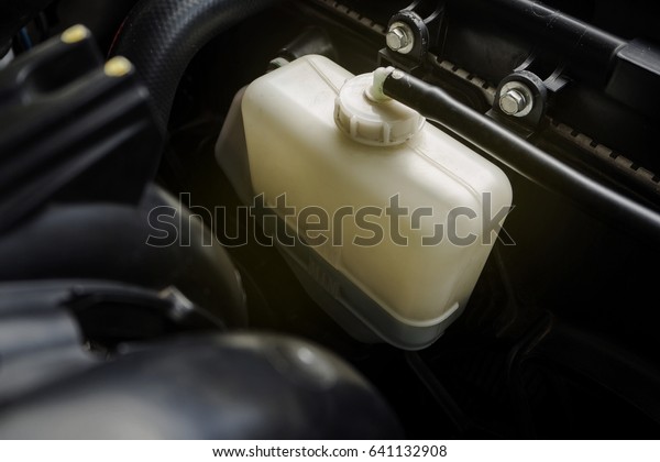 Car Coolant Expansion\
Tank