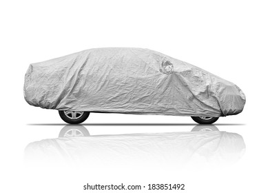A car with cover sheet for sunlight, rain and dust protection isolated on white background.