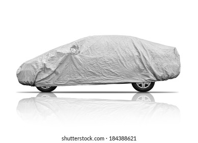 A car with cover sheet for sunlight, rain and dust protection