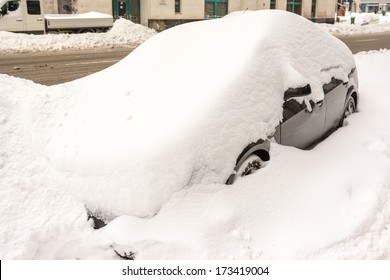 Car Covered In Fresh White Snow