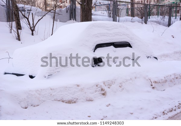 Car Covered In Fresh White Snow, Cars covered in\
snow after a blizzard