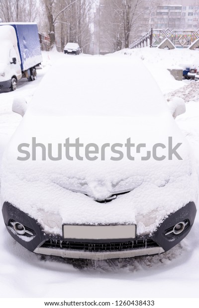 Car Covered In Fresh White Snow, Cars covered in
snow after a blizzard