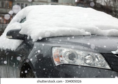 Car Covered With Snow