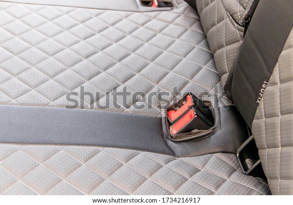 Car covers made of eco leather.\
An article about the upholstery of seats in a car. Premium cases.\
Premium car design. Rich car finish. Gray eco leather\
covers.