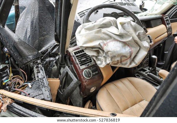 Car crash accident
background for car insurance use. Inside automobile after wreck.
Driver air bag deployed. Car accident, insurance concept. Claim the
insurance company.