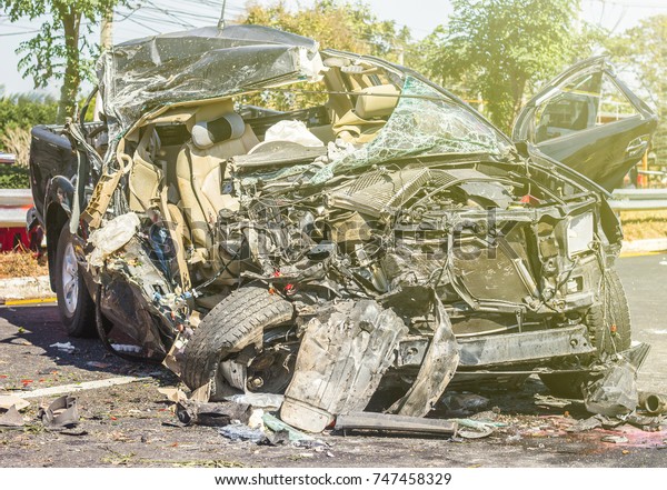 Car crash from car accident
on the road wait insurance. car accident and sun illuminate  in a
city