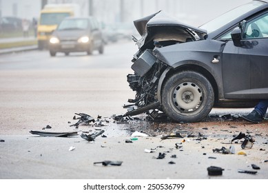 car crash accident on street, damaged automobiles after collision in city - Shutterstock ID 250536799