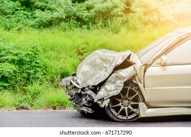 car crash accident on street, car accident from rain, damaged automobiles after collision in city - Shutterstock ID 671717290