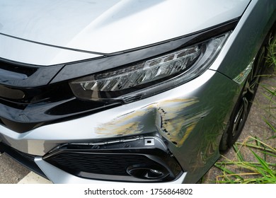 Car Crash Accident On Street.superficial Lesion On The Lateral Aerior Surface, Soft Tissue Damage Of Vehicle.