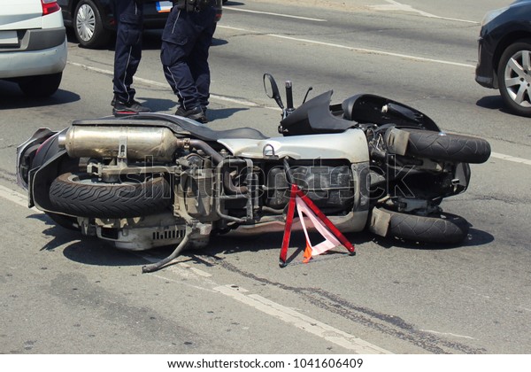 Car\
crash collision accident with scooter, motor\
bike