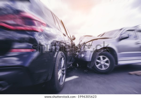 Car crash\
dangerous accident on the road. SUV car crashing beside another one\
on the road with speed zoom\
blur.