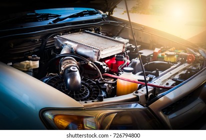 Car crash open hood car mechanic to check condition of damage. See the radiator cooling panel Engine and electronic system for mechanic to check damage thoroughly to repair engine to complete for use. - Shutterstock ID 726794800