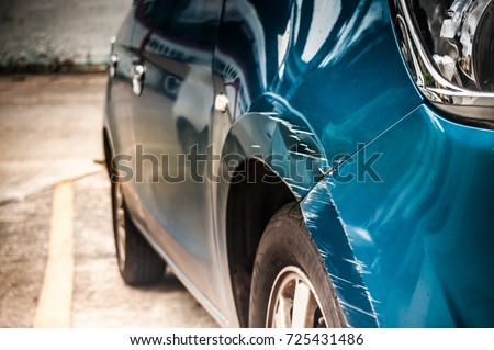 The car and the crash point above the wheel