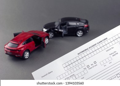 Car Crash Scene And Car Insurance Document. Cheap Car Insurance Concept. Gray Background