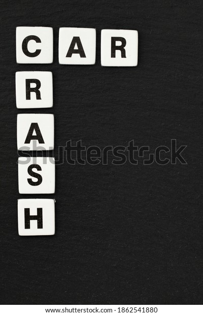 car crash word on cardboard paper blocks, directly\
above view