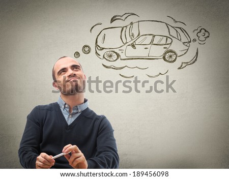 Car credit concept. Man dreaming about car