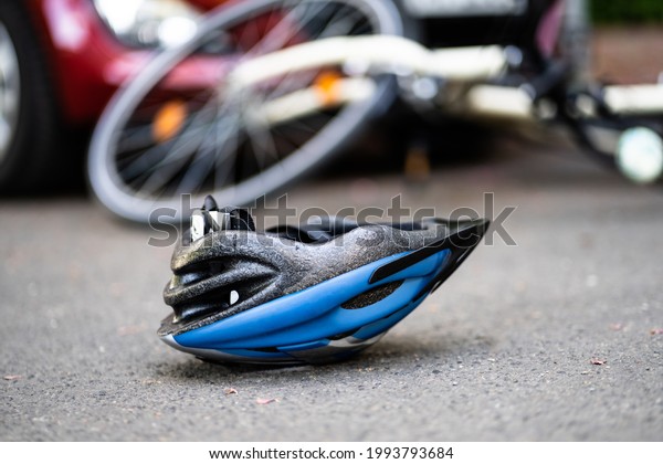 Car And\
Cyclist Accident And Injury. Bicycle\
Crash