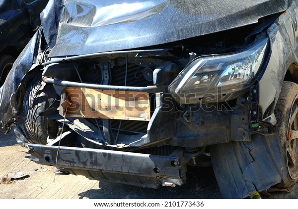 car damage images from car crashes on\
main roads in Thailand, sedans and pick-up\
cars