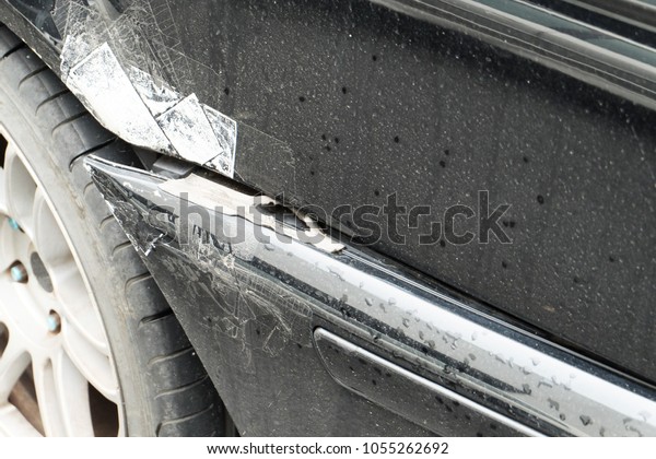 Car damaged by auto\
accident.