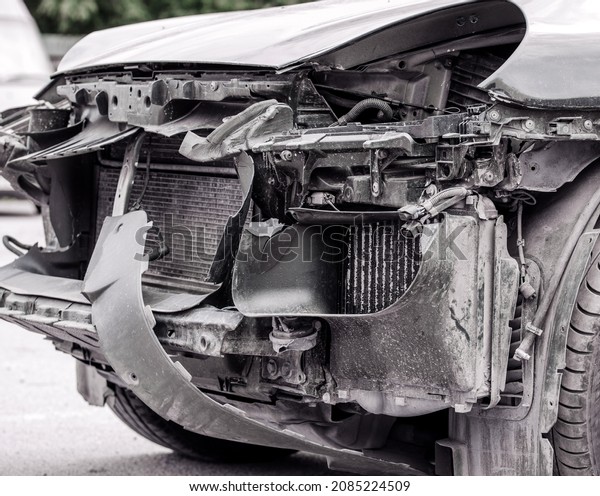 car with damaged headlamp after accident.
insurance concept.