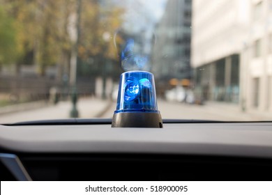 car dash with rotating emergency light