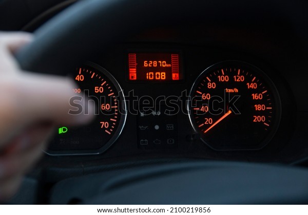 Car dashboard with\
illuminated indicators