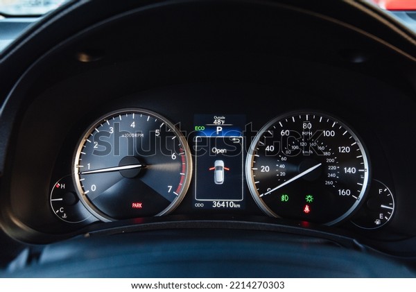 Car Dashboard. Dashboard modern car\
control with backlight speed display\
panel.