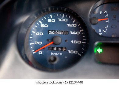 Car Dashboard Odometer Showing 200,000 Miles