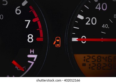 Car Dashboard Showing Door Ajar Warning Light