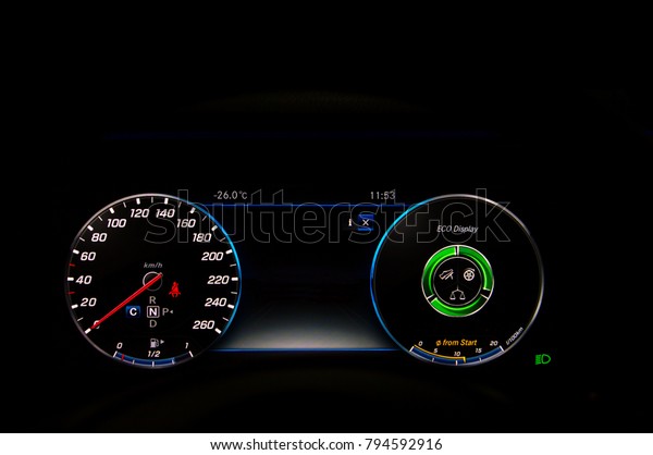 Car dashboard with a speedometer, tachometer, fuel
gauge, clock and exterior temperature gauges. The exterior
temperature showing -26C.