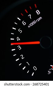 car dashboard speedometer tachometer macro
