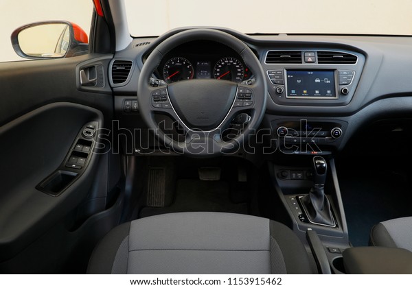 Car dashboard and steering wheel, modern car\
interior dashboard