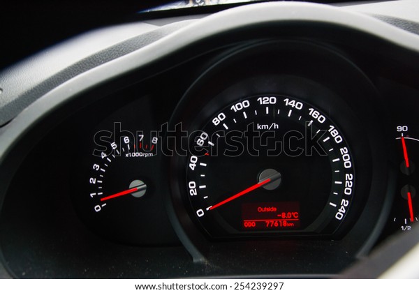 Car Dashboard with\
white and red lights