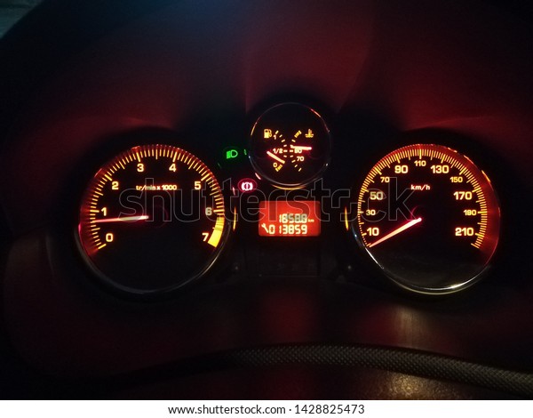 car dashboard yellow\
light odometer
