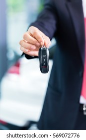 Car Dealer Handing Over Auto Key Stock Photo 569072776 | Shutterstock