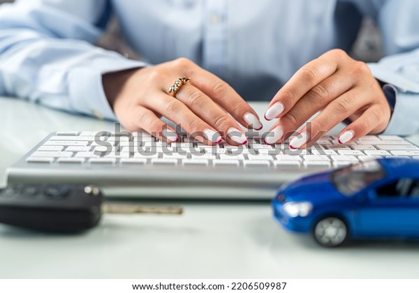Car\
dealerships offer car ownership contracts at interest rates in\
their offices. Desktop. Keyboard with car\
model